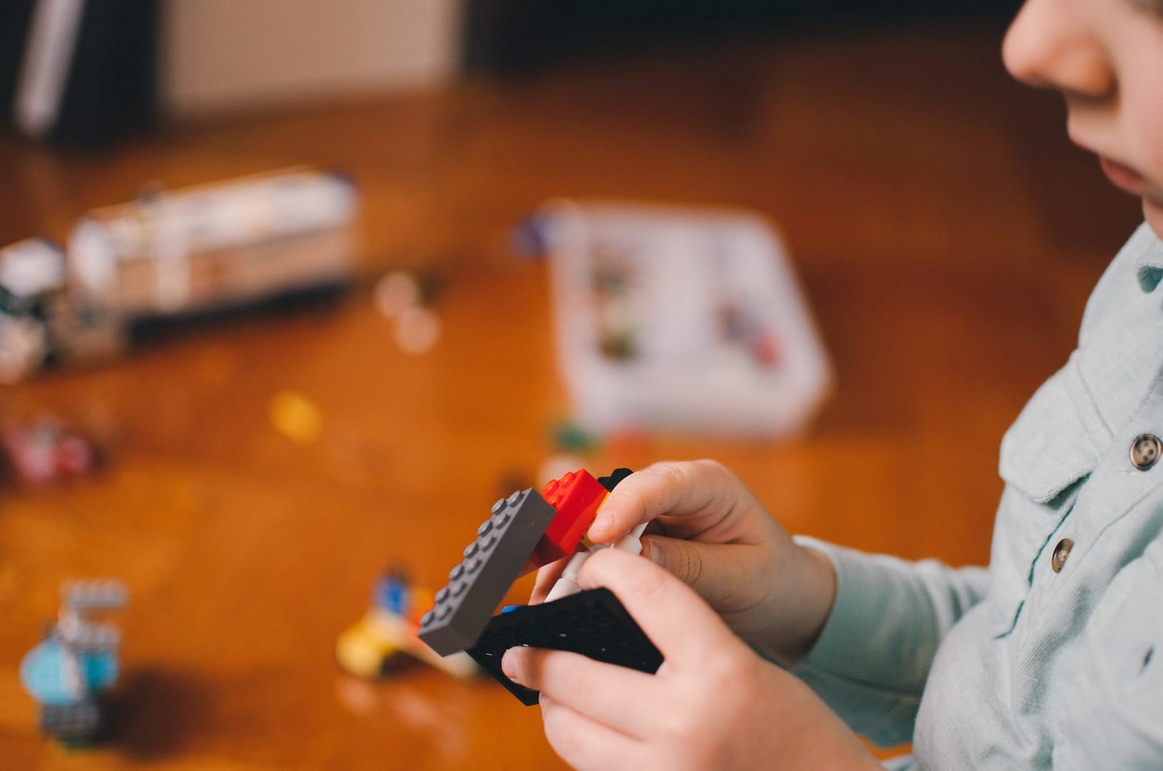 Boy playing with Lego